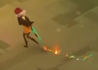 Red dragging the sword along the ground, leaving a glowing trail